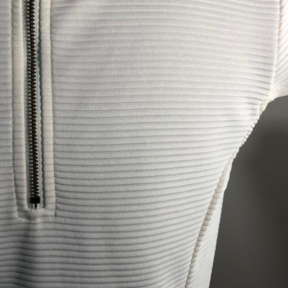 Striking Architectural Peplum Top - Picture 6 of 10